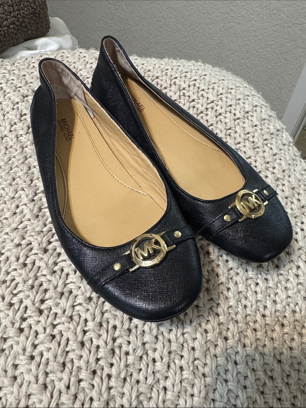 MICHAEL Michael Kors Black Leather Logo Ballet Flats with Gold Emblem